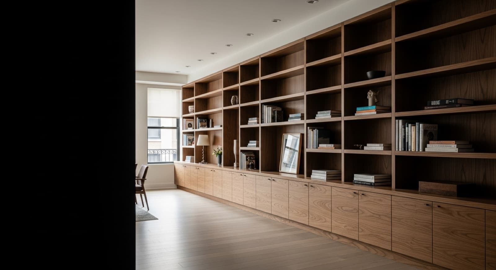 Custom walnut built-in shelving in a Chicago living room
